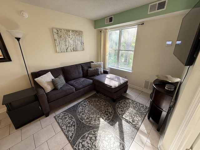 200 Sandestin Ln Unit 612, Miramar Beach, FL 32550 - living area with light tile patterned floors and a textured ceiling