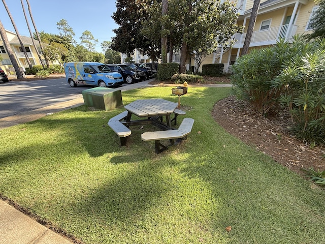 200 Sandestin Ln Unit 612, Miramar Beach, FL 32550 - view of property's community featuring a lawn and uncovered parking