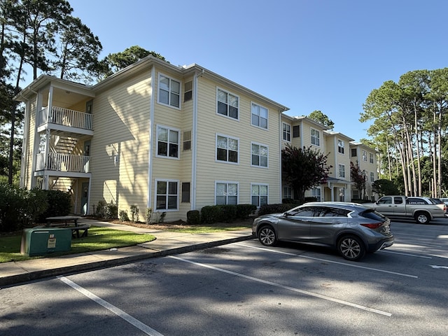 200 Sandestin Ln Unit 612, Miramar Beach, FL 32550 - view of building exterior featuring uncovered parking