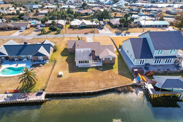 702 Beachcomber Dr, Lynn Haven, FL 32444 - aerial view of residential area with a large body of water and a pool