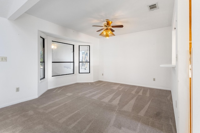 702 Beachcomber Dr, Lynn Haven, FL 32444 - carpeted spare room with a ceiling fan and baseboards