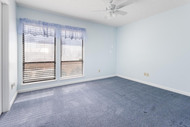 702 Beachcomber Dr, Lynn Haven, FL 32444 - carpeted empty room with a ceiling fan and baseboards