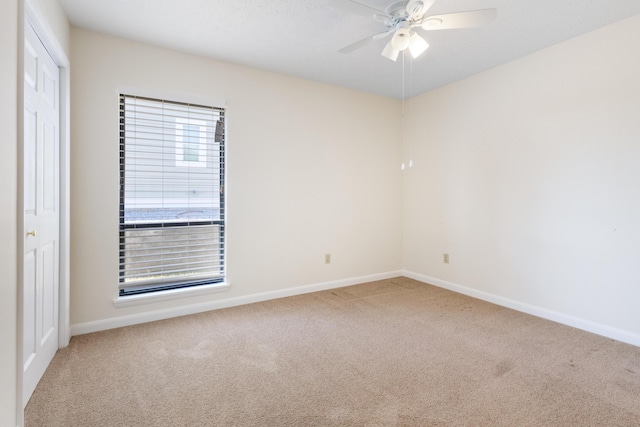 702 Beachcomber Dr, Lynn Haven, FL 32444 - empty room featuring carpet and a ceiling fan