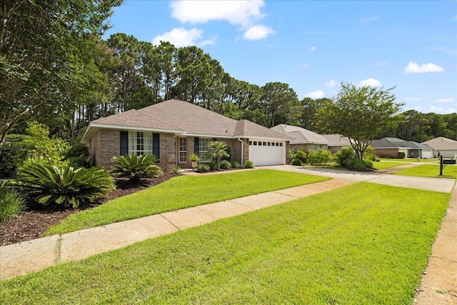 3928 Mesa Rd, Destin, FL 32541 - ranch-style house featuring driveway, an attached garage, brick siding, a front lawn, and roof with shingles