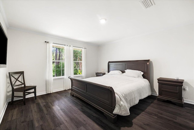3928 Mesa Rd, Destin, FL 32541 - bedroom featuring dark wood finished floors and crown molding