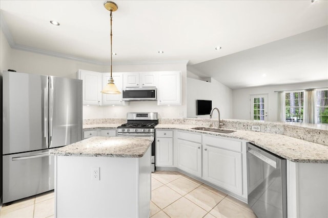 3928 Mesa Rd, Destin, FL 32541 - kitchen with appliances with stainless steel finishes, light tile patterned floors, a peninsula, white cabinetry, and light stone counters