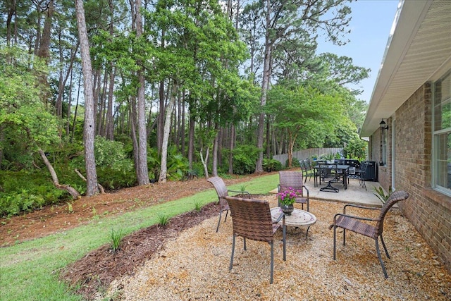 3928 Mesa Rd, Destin, FL 32541 - view of yard with a patio and outdoor dining space