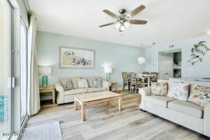 17757 Front Beach Rd Unit 507, Panama City Beach, FL 32413 - living area featuring a ceiling fan and wood finished floors