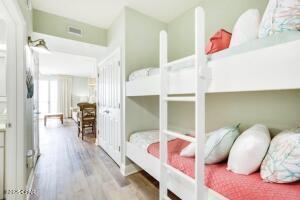 17757 Front Beach Rd Unit 507, Panama City Beach, FL 32413 - bedroom featuring wood finished floors