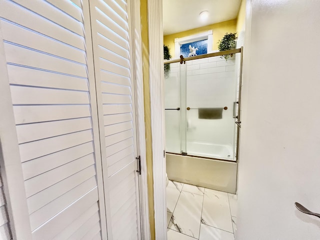226 N Marsh Lndg, Freeport, FL 32439 - bathroom featuring shower / bath combination with glass door