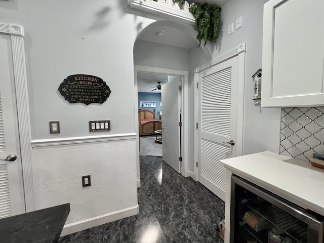 226 N Marsh Lndg, Freeport, FL 32439 - hall with wine cooler and arched walkways