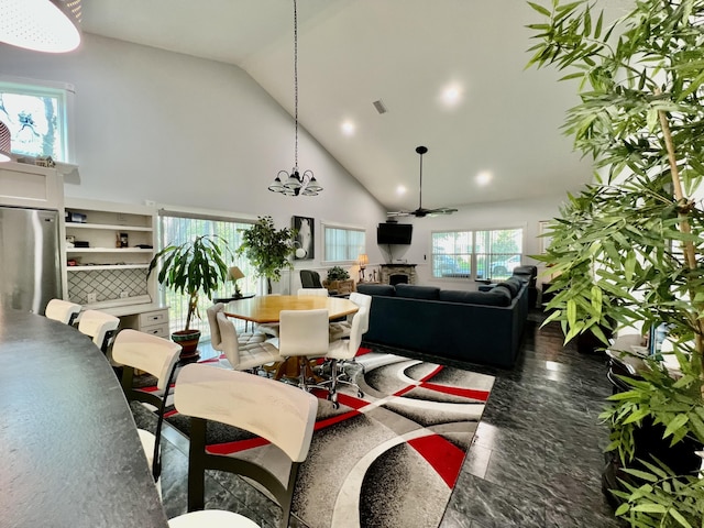 226 N Marsh Lndg, Freeport, FL 32439 - dining room featuring a fireplace, high vaulted ceiling, and recessed lighting