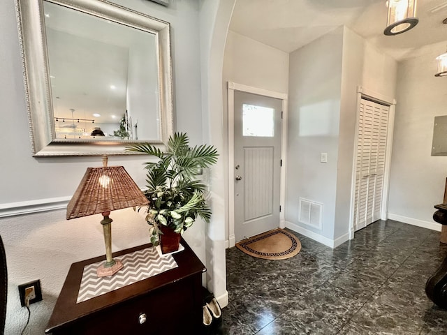 226 N Marsh Lndg, Freeport, FL 32439 - entrance foyer featuring arched walkways and marble finish flooring
