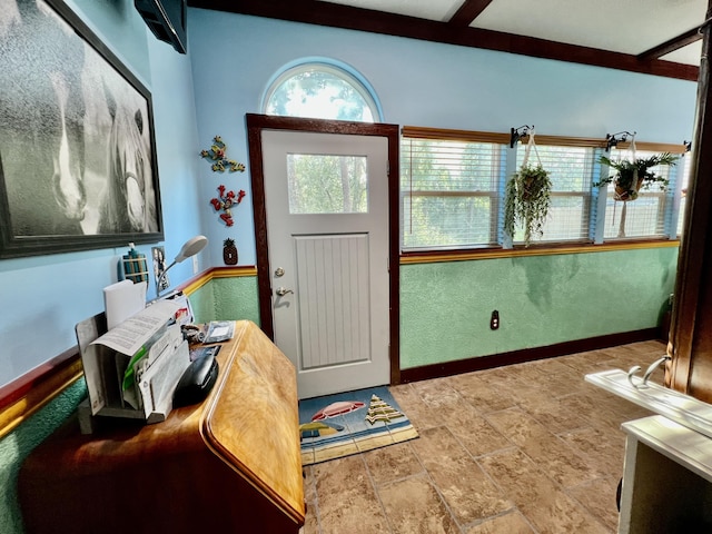 226 N Marsh Lndg, Freeport, FL 32439 - foyer featuring stone finish flooring and baseboards