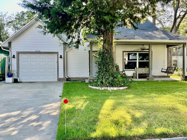 226 N Marsh Lndg, Freeport, FL 32439 - view of front of property with an attached garage, driveway, a front yard, and roof with shingles