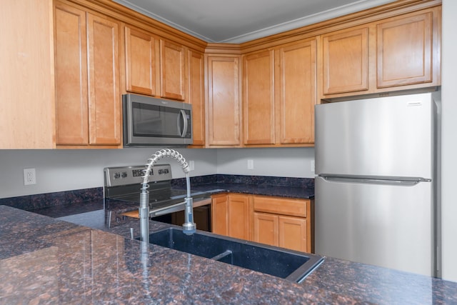 289 Mattie M Kelly Blvd, Destin, FL 32541 - kitchen featuring appliances with stainless steel finishes and dark stone countertops