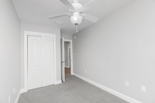 289 Mattie M Kelly Blvd, Destin, FL 32541 - unfurnished bedroom featuring carpet floors, a closet, and ceiling fan