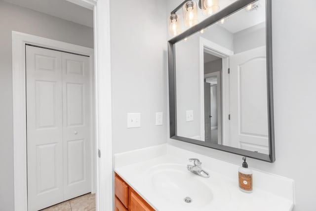 289 Mattie M Kelly Blvd, Destin, FL 32541 - bathroom with vanity, a closet, and tile patterned floors