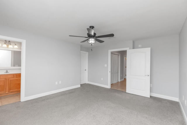 289 Mattie M Kelly Blvd, Destin, FL 32541 - unfurnished bedroom with carpet floors, ensuite bath, and a ceiling fan