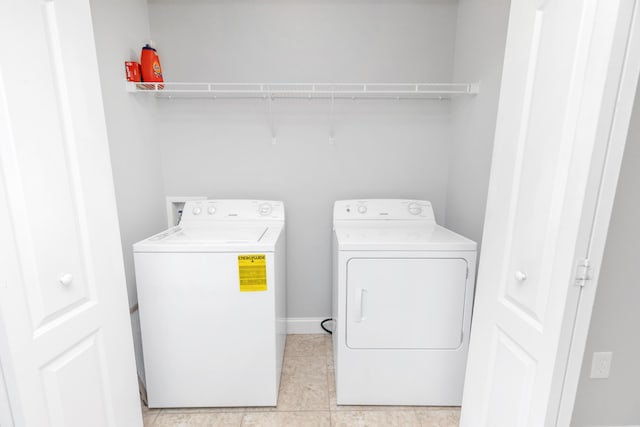 289 Mattie M Kelly Blvd, Destin, FL 32541 - laundry area featuring independent washer and dryer and light tile patterned floors