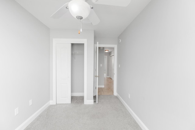 289 Mattie M Kelly Blvd, Destin, FL 32541 - unfurnished bedroom with carpet flooring, a closet, and ceiling fan