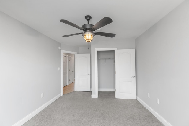 289 Mattie M Kelly Blvd, Destin, FL 32541 - unfurnished bedroom featuring carpet flooring, a closet, and a ceiling fan