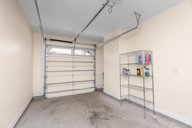 289 Mattie M Kelly Blvd, Destin, FL 32541 - garage featuring baseboards
