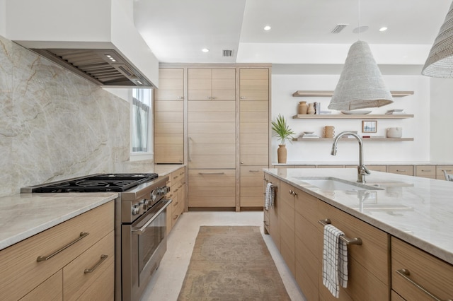 40 Silver Sea Ct Unit Aa4, Inlet Beach, FL 32461 - kitchen featuring high end stainless steel range oven, open shelves, premium range hood, light brown cabinets, and light stone counters