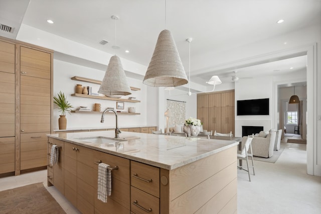 40 Silver Sea Ct Unit Aa4, Inlet Beach, FL 32461 - kitchen with modern cabinets, open shelves, a spacious island, recessed lighting, and light stone countertops