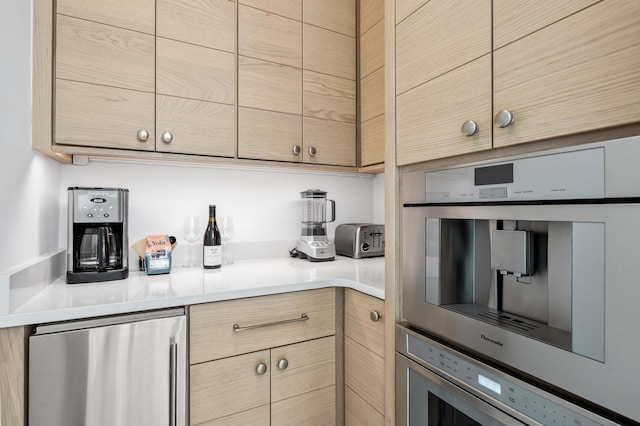 40 Silver Sea Ct Unit Aa4, Inlet Beach, FL 32461 - kitchen featuring fridge, stainless steel oven, and light countertops