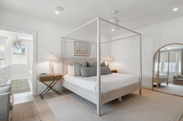 40 Silver Sea Ct Unit Aa4, Inlet Beach, FL 32461 - bedroom featuring multiple windows, light wood-type flooring, recessed lighting, and a chandelier
