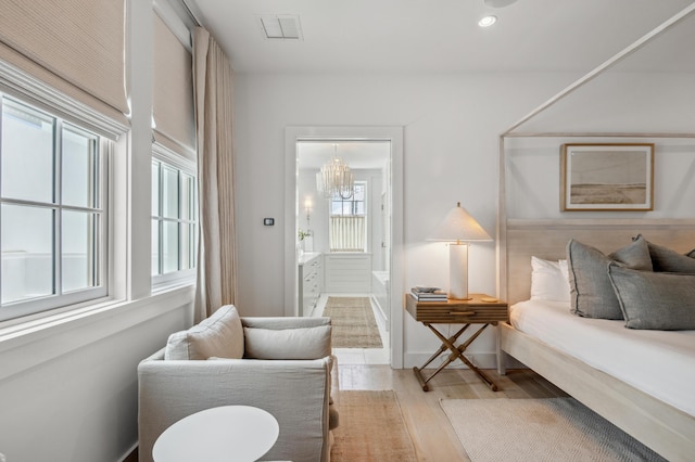 40 Silver Sea Ct Unit Aa4, Inlet Beach, FL 32461 - living area featuring wood finished floors, a chandelier, and recessed lighting
