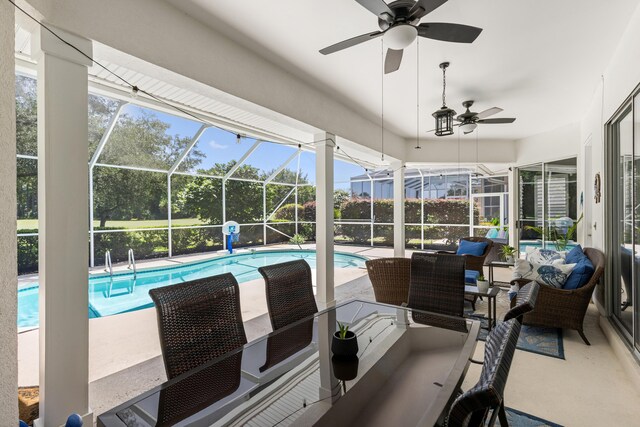 96 Garnet Pl, Destin, FL 32541 - swimming pool with ceiling fan, an outdoor living space, a patio area, and a lanai