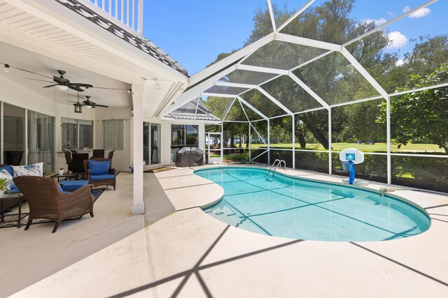 96 Garnet Pl, Destin, FL 32541 - swimming pool featuring a patio, ceiling fan, and glass enclosure