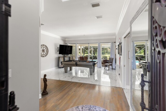 96 Garnet Pl, Destin, FL 32541 - foyer entrance featuring billiards, marble tiled flooring, and crown molding