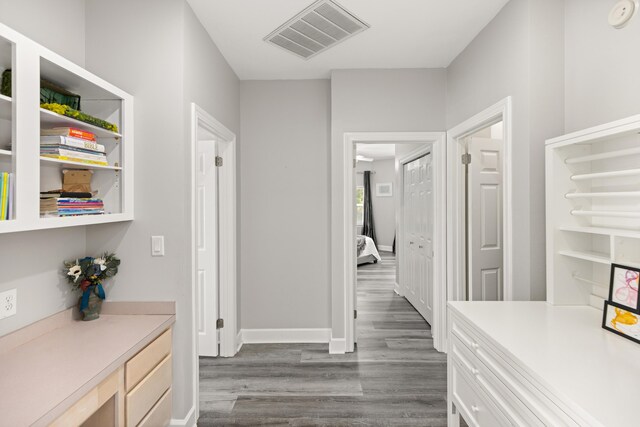 96 Garnet Pl, Destin, FL 32541 - hallway featuring dark wood finished floors and baseboards