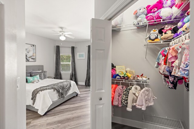 96 Garnet Pl, Destin, FL 32541 - bedroom with wood finished floors and a ceiling fan