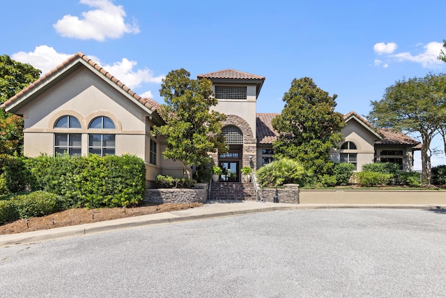 96 Garnet Pl, Destin, FL 32541 - mediterranean / spanish-style house with stucco siding and a tile roof