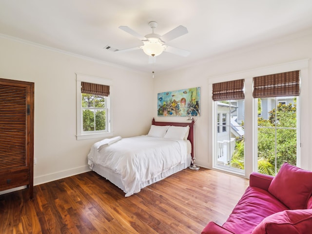 16 Beachberry Ln, Santa Rosa Beach, FL 32459 - bedroom with access to outside, crown molding, wood finished floors, and a ceiling fan
