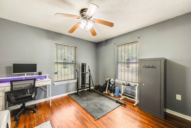 965 B St, Crestview, FL 32536 - office area with wood finished floors, a ceiling fan, and a textured ceiling