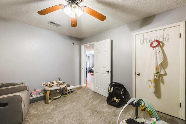 965 B St, Crestview, FL 32536 - game room featuring carpet floors, a ceiling fan, and a textured ceiling