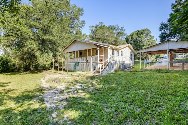 965 B St, Crestview, FL 32536 - view of front of property with stairs and a carport