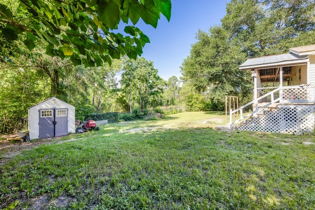 965 B St, Crestview, FL 32536 - fenced backyard featuring a shed and view of scattered trees