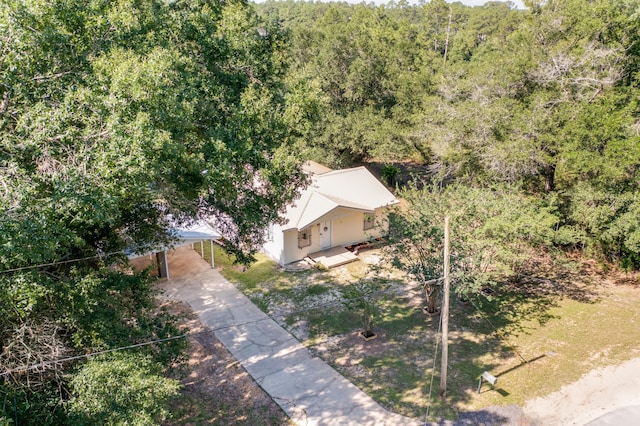 965 B St, Crestview, FL 32536 - aerial view of property and surrounding area featuring a heavily wooded area