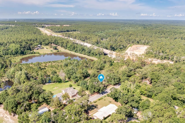 965 B St, Crestview, FL 32536 - aerial overview of property's location with a heavily wooded area and a large body of water