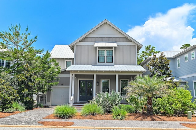 257 Matts Way, Santa Rosa Beach, FL 32459 - view of front facade with board and batten siding, a porch, a standing seam roof, a metal roof, and a garage