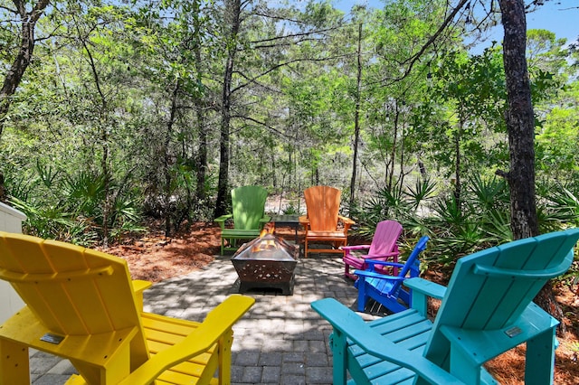 257 Matts Way, Santa Rosa Beach, FL 32459 - view of patio featuring an outdoor fire pit