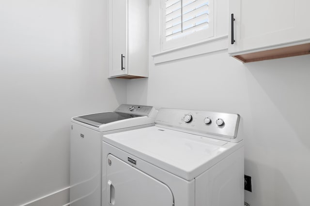 257 Matts Way, Santa Rosa Beach, FL 32459 - washroom with cabinet space and washer and clothes dryer