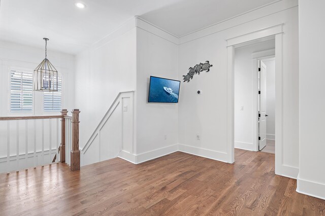 257 Matts Way, Santa Rosa Beach, FL 32459 - spare room featuring a chandelier, wood finished floors, and recessed lighting