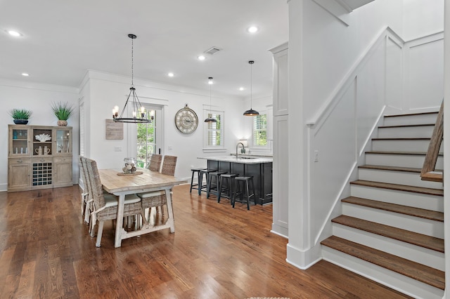 257 Matts Way, Santa Rosa Beach, FL 32459 - dining area featuring healthy amount of natural light, stairway, crown molding, recessed lighting, and dark wood-style flooring